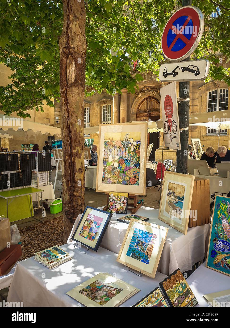 Aix-en-Provence, France, May 2022, view of some pictures and paintings in an artist market at place de l`Université Stock Photo